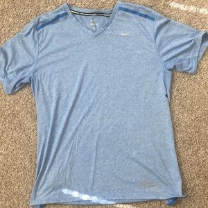 Light blue men’s Nike running shirt